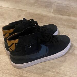 Nike Black High-Top Sneakers with Tan Heel Panel